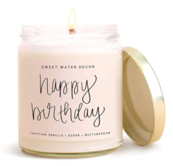 happy birthday scented candle with flame